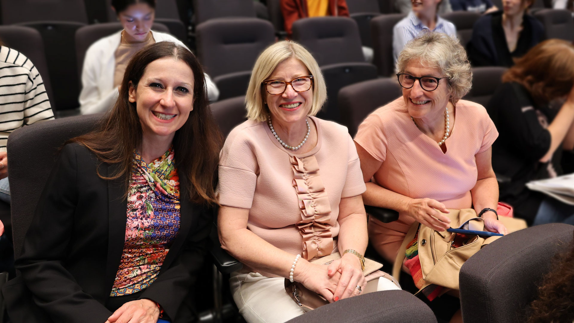 Karin Werer, Ulrike Schlachter and Maddalena Velona sit next to each other, smiling